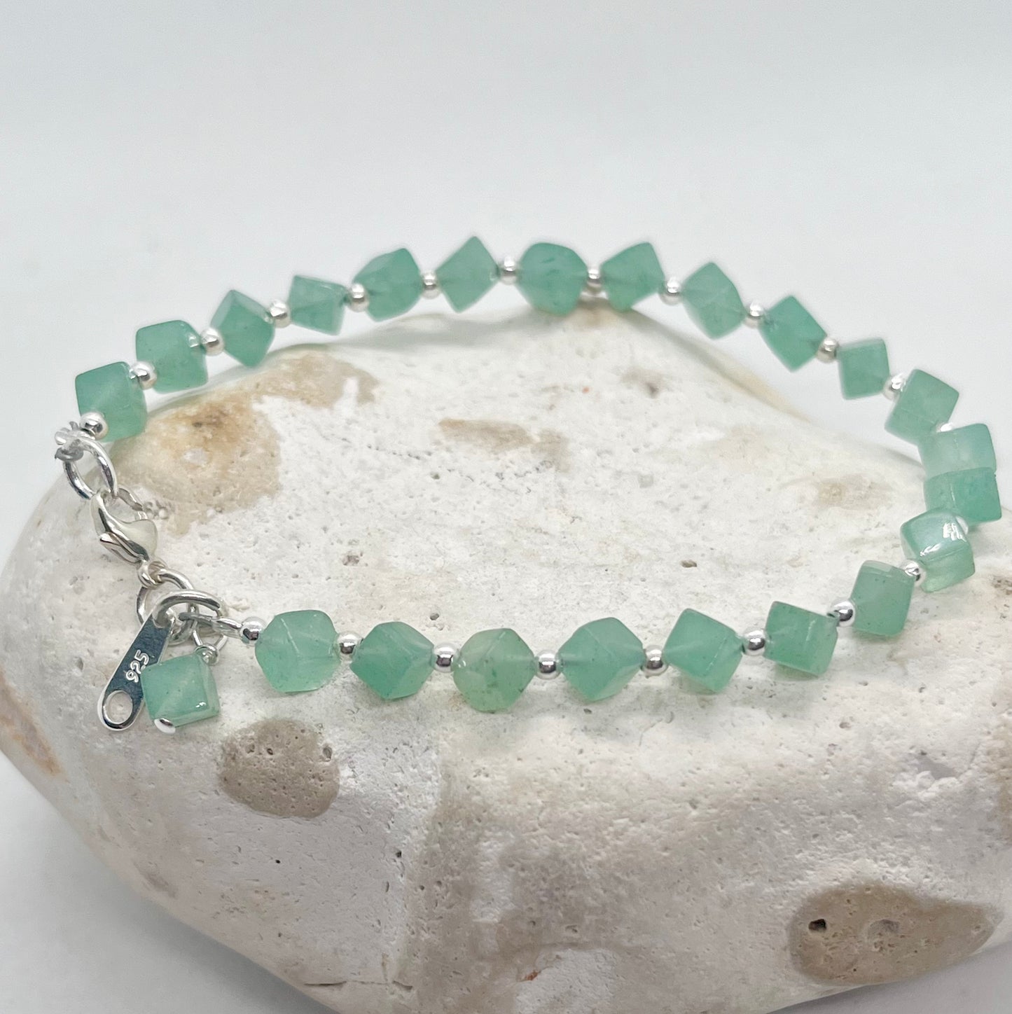 Silver bead ball and green crystal bracelet silver clasp and charms